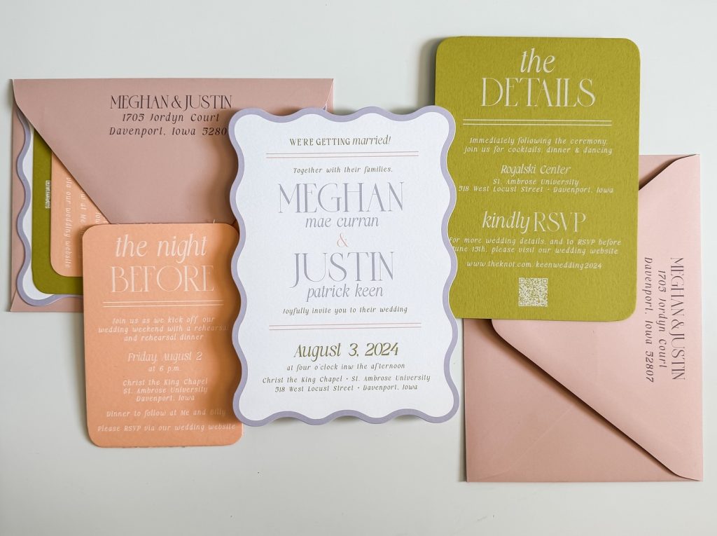 Invitation suite featuring peachy-pink envelopes and chartreuse details card for Meghan and Justin's August wedding