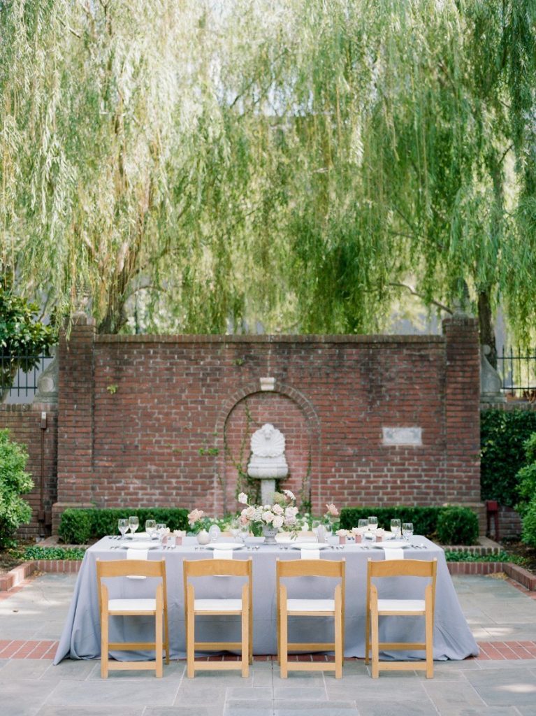 french country wedding vignette showing how guest count can affect wedding budget