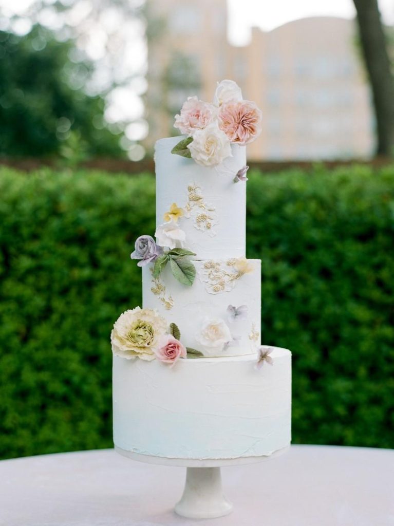 french country wedding vignette showing how guest count can affect wedding budget