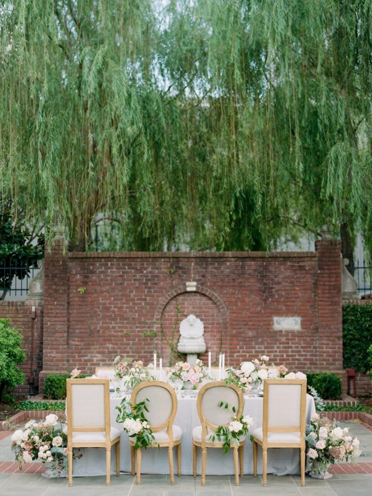 french country wedding vignette showing how guest count can affect wedding budget