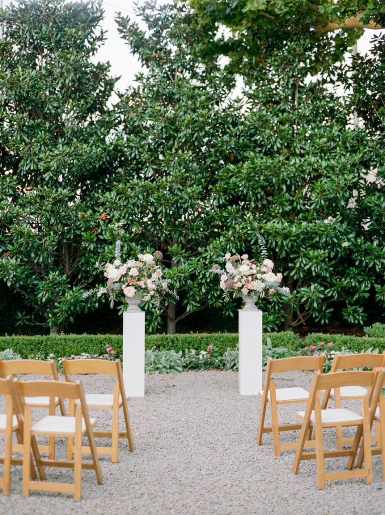 french country wedding vignette showing how guest count can affect wedding budget