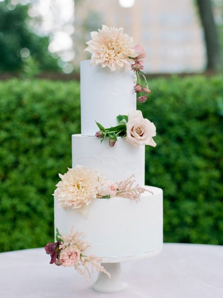 french country wedding vignette showing how guest count can affect wedding budget