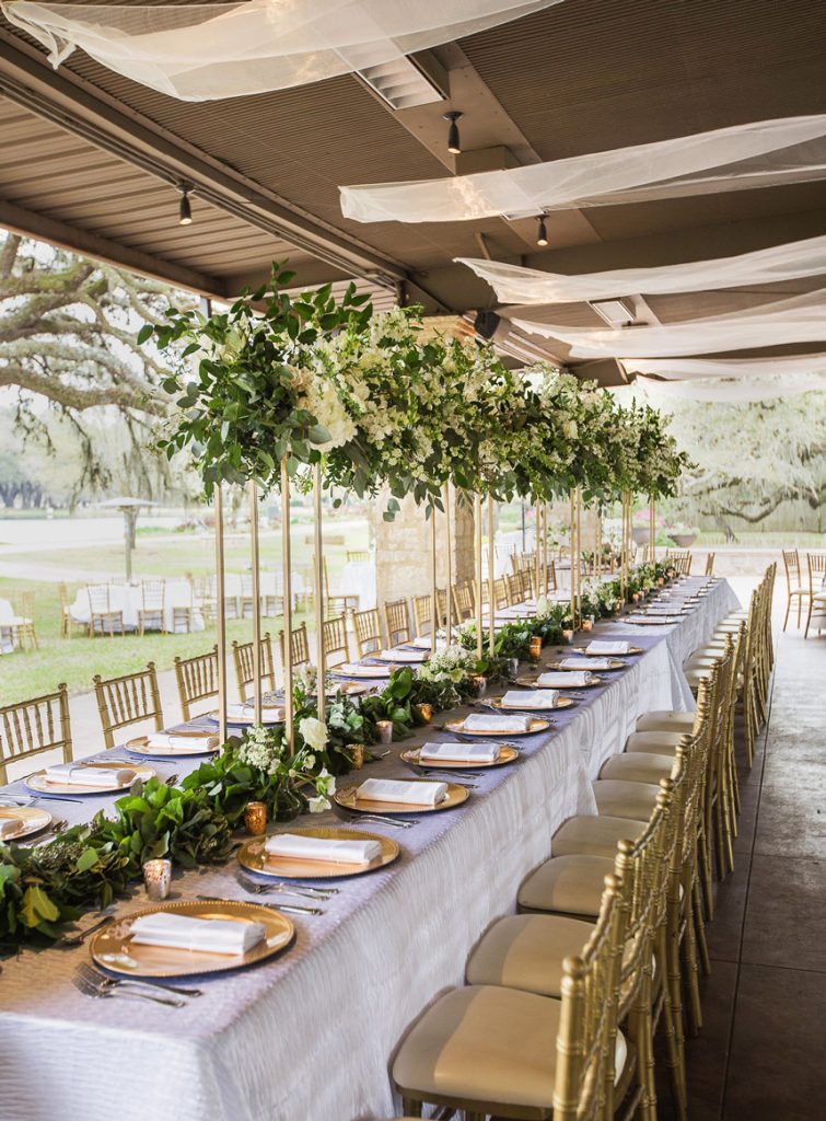 large wedding table from houston wedding planner alyssa meeks explaining ways to make a large wedding feel intimate