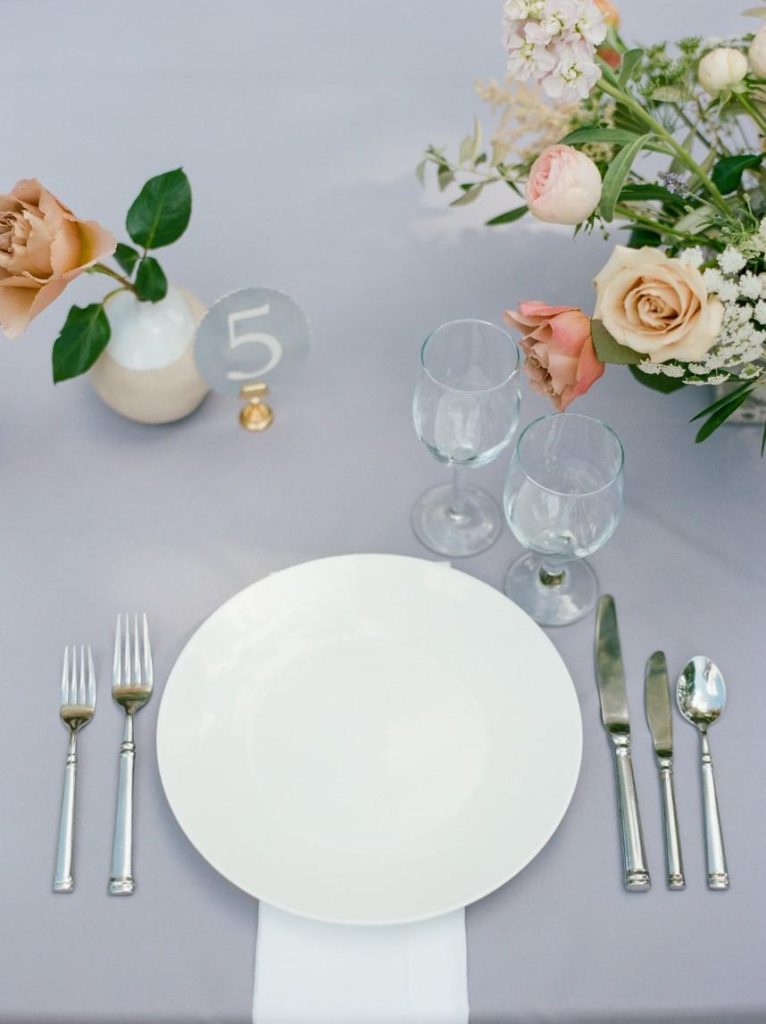 french country wedding vignette showing how guest count can affect wedding budget