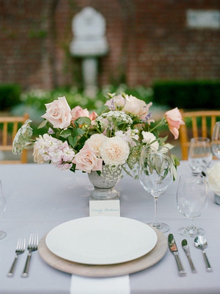 french country wedding vignette showing how guest count can affect wedding budget