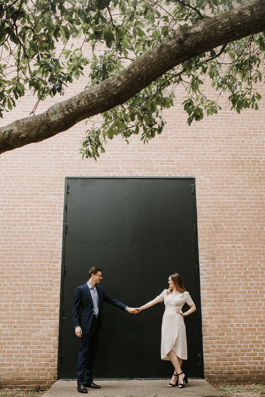 couple holding hands - how to get significant other involved in wedding planning