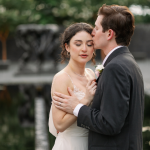 Groom kissing brides head, bride has beautiful soft glam makeup