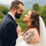 bride and groom looking into eachothers eyes, bride has tattoo on her shoulder