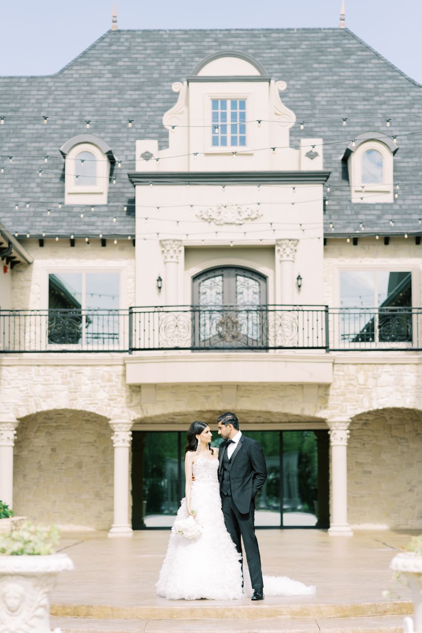 couple standing in front of knotting hill place