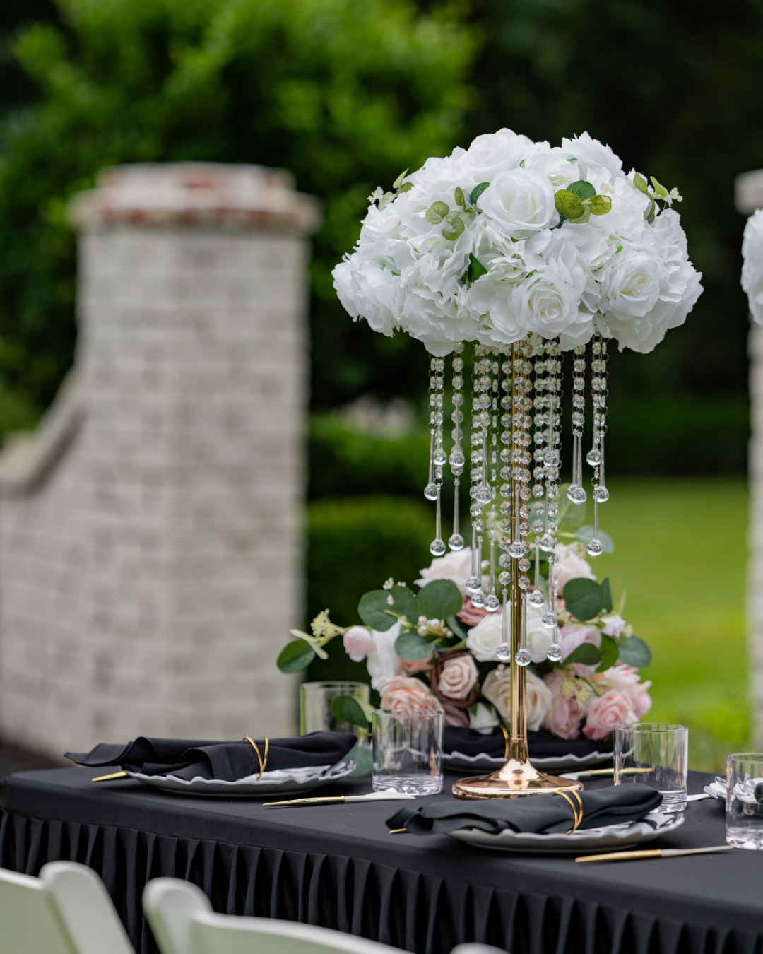 wedding reception with white florals and crystals