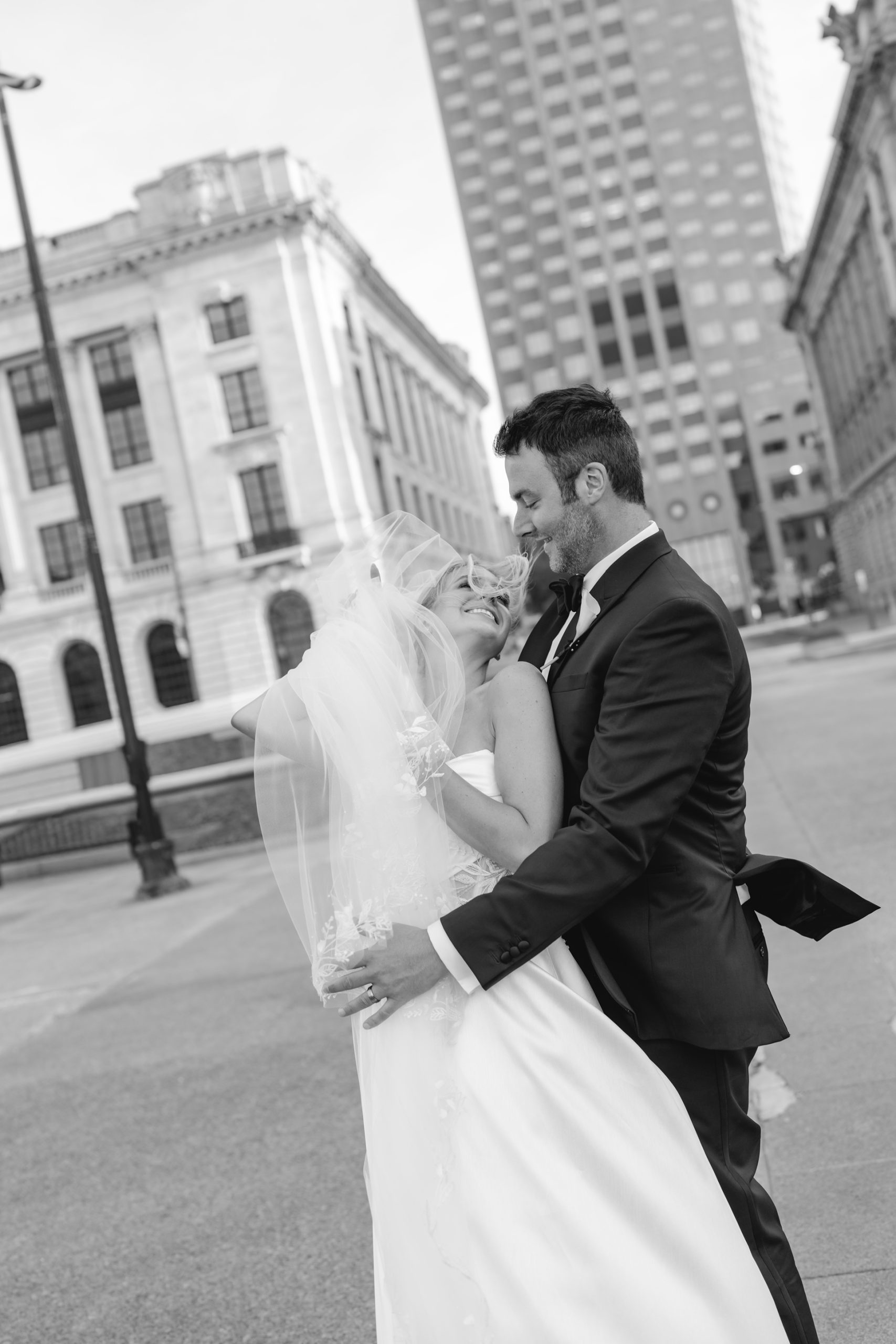 Danielle and Tom in classic Old Hollywood-inspired wedding portrait on Cleveland street