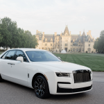 White Rolls-Royce luxury sedan parked at Biltmore Estate