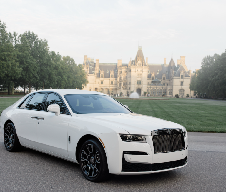 White Rolls-Royce luxury sedan parked at Biltmore Estate