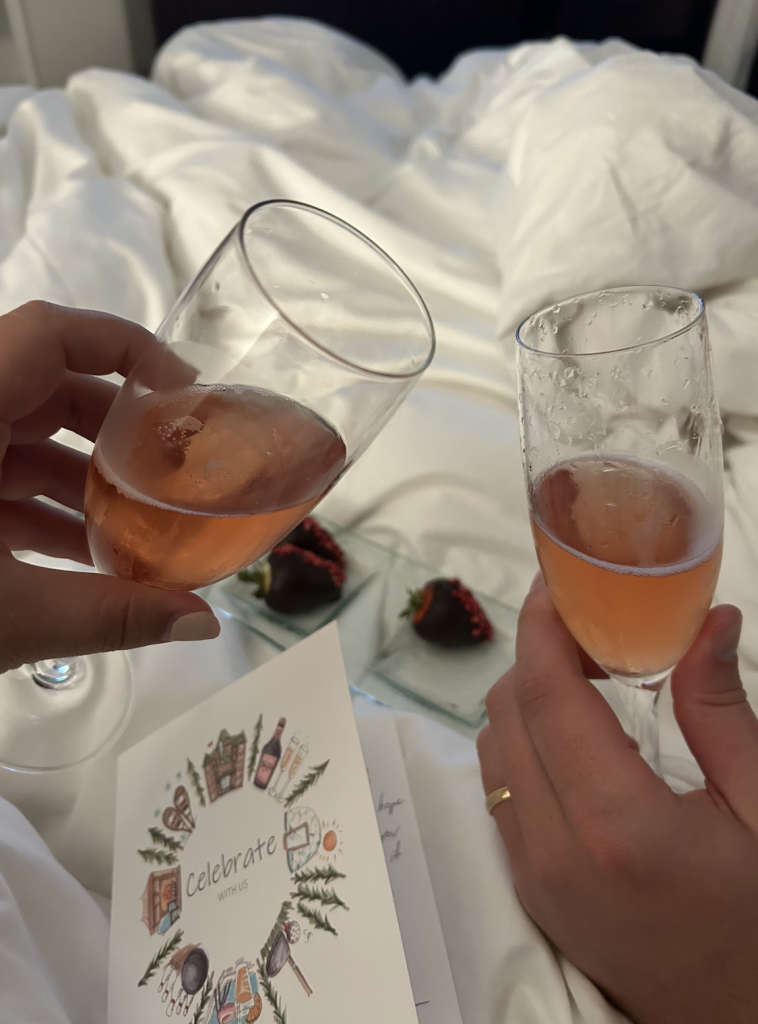 Guests toasting with champagne glasses at wedding celebration