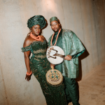 cultural wedding guests in green and oragne
