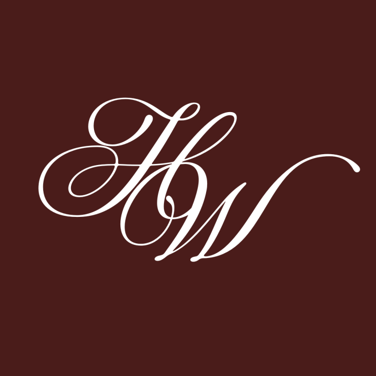House of Willingham elegant script monogram logo in white on burgundy background