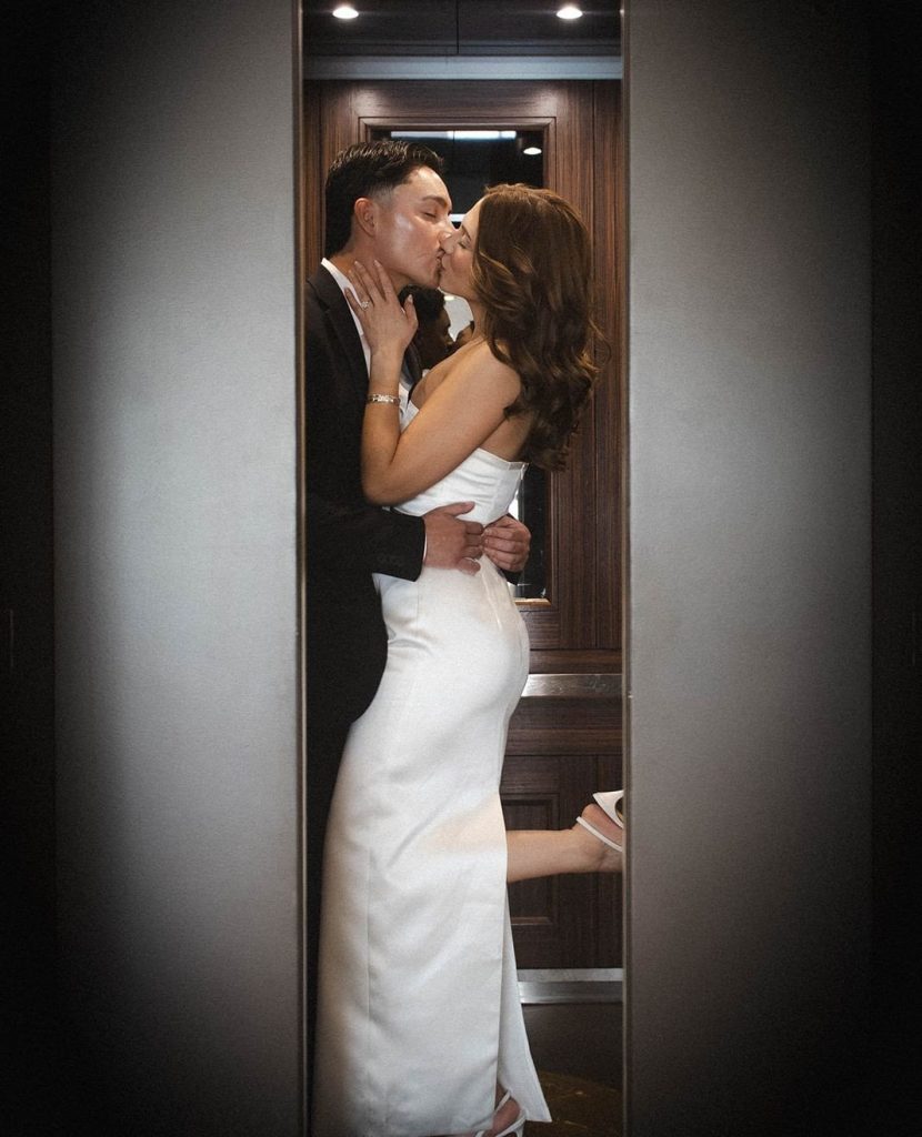 Bride and groom sharing an intimate kiss in Hotel Paso del Norte elevator