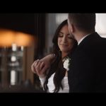 Bride and groom in tender embrace during intimate wedding moment