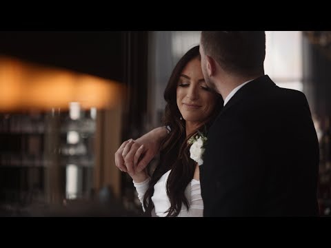Bride and groom in tender embrace during intimate wedding moment