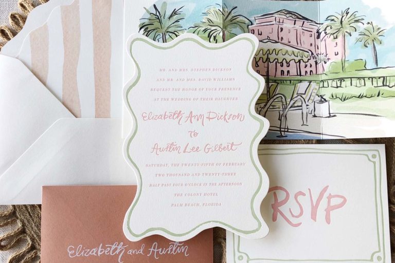 Custom wedding invitation suite with watercolor venue illustration, calligraphy names, and coral accents