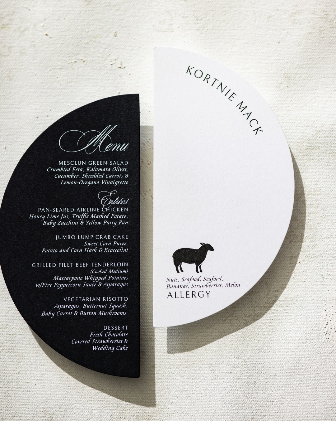 Circular black and white wedding menu and allergy card with guest name in modern typography