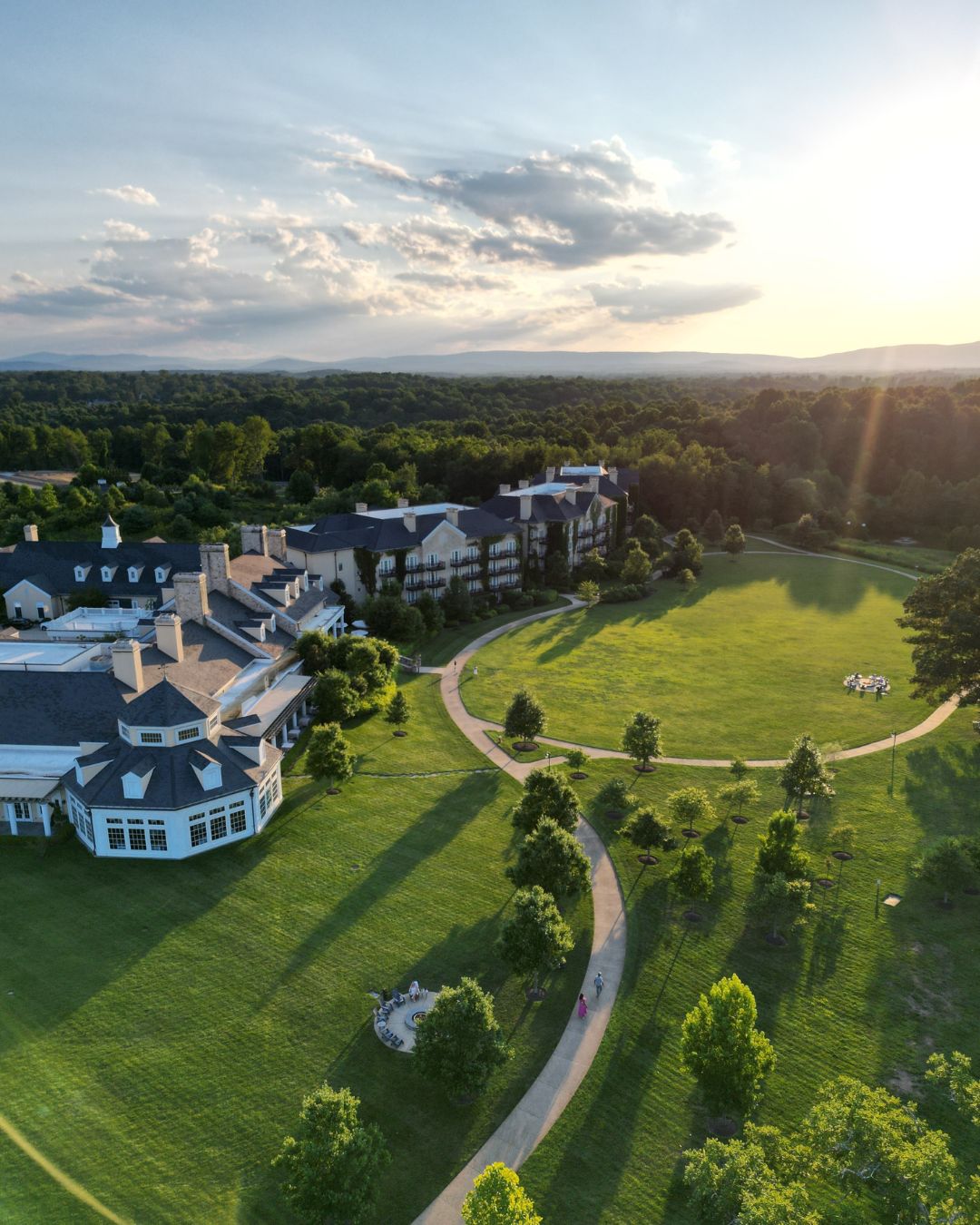 Aerial view of Northern Virginia wedding venue estate surrounded by rolling hills at sunset