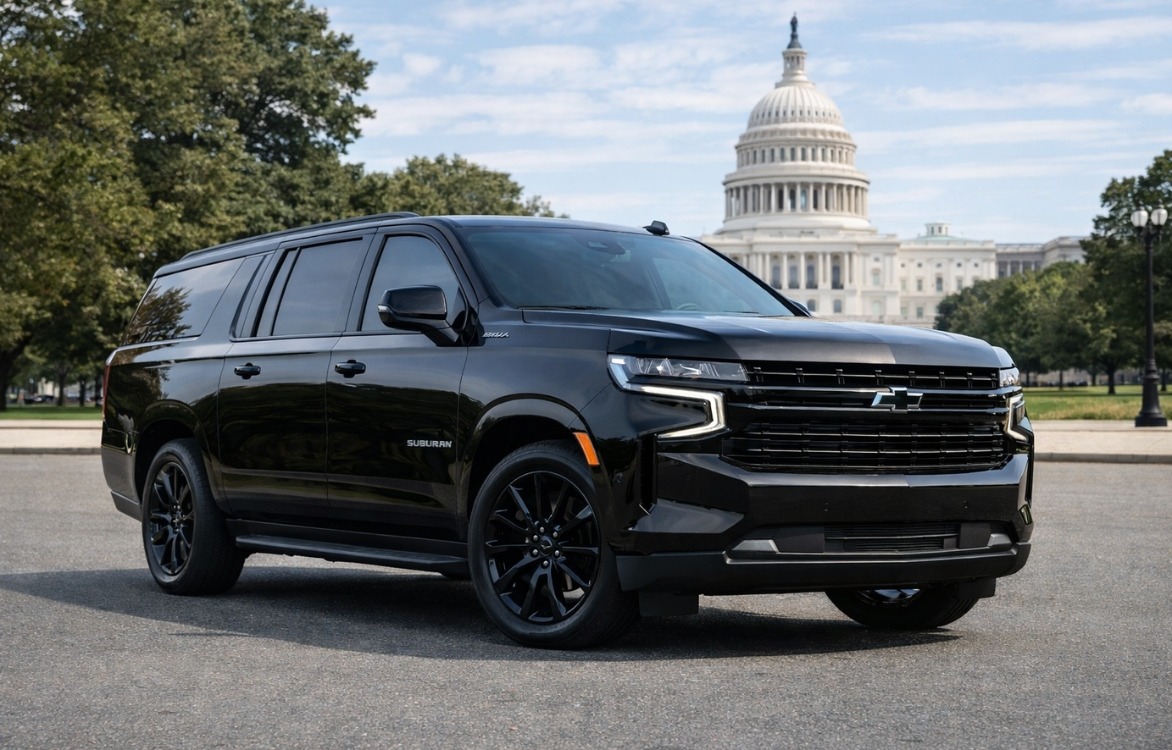 Black Chevrolet Suburban SUV positioned in front of U.S. Capitol Building