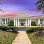 Elegant Northern Virginia wedding venue featuring white columned portico at sunset
