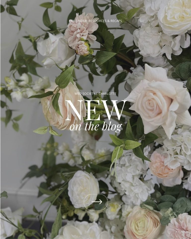 Elegant white and blush pink wedding floral arrangement with roses and peonies