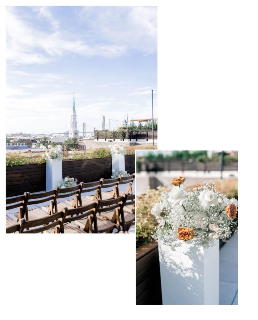 Rooftop wedding ceremony setup at Perry Lane Hotel with wooden chairs and baby's breath arrangements overlooking Savannah skyline