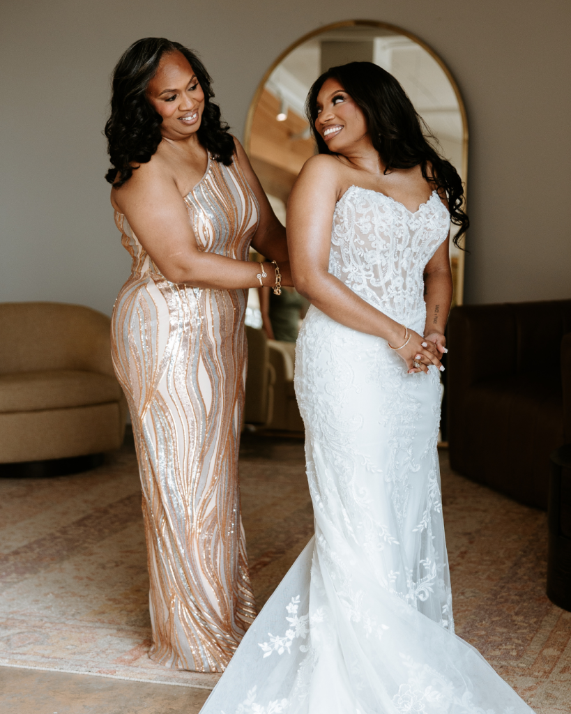 Bride Ana getting ready with her mother before her elegant black tie wedding at The Casey in Charlotte