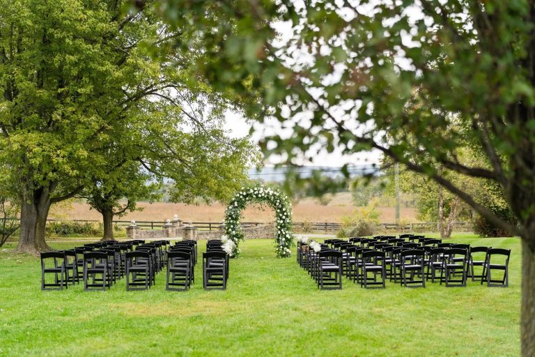 outdoor simple ceremony space overlooking pasture