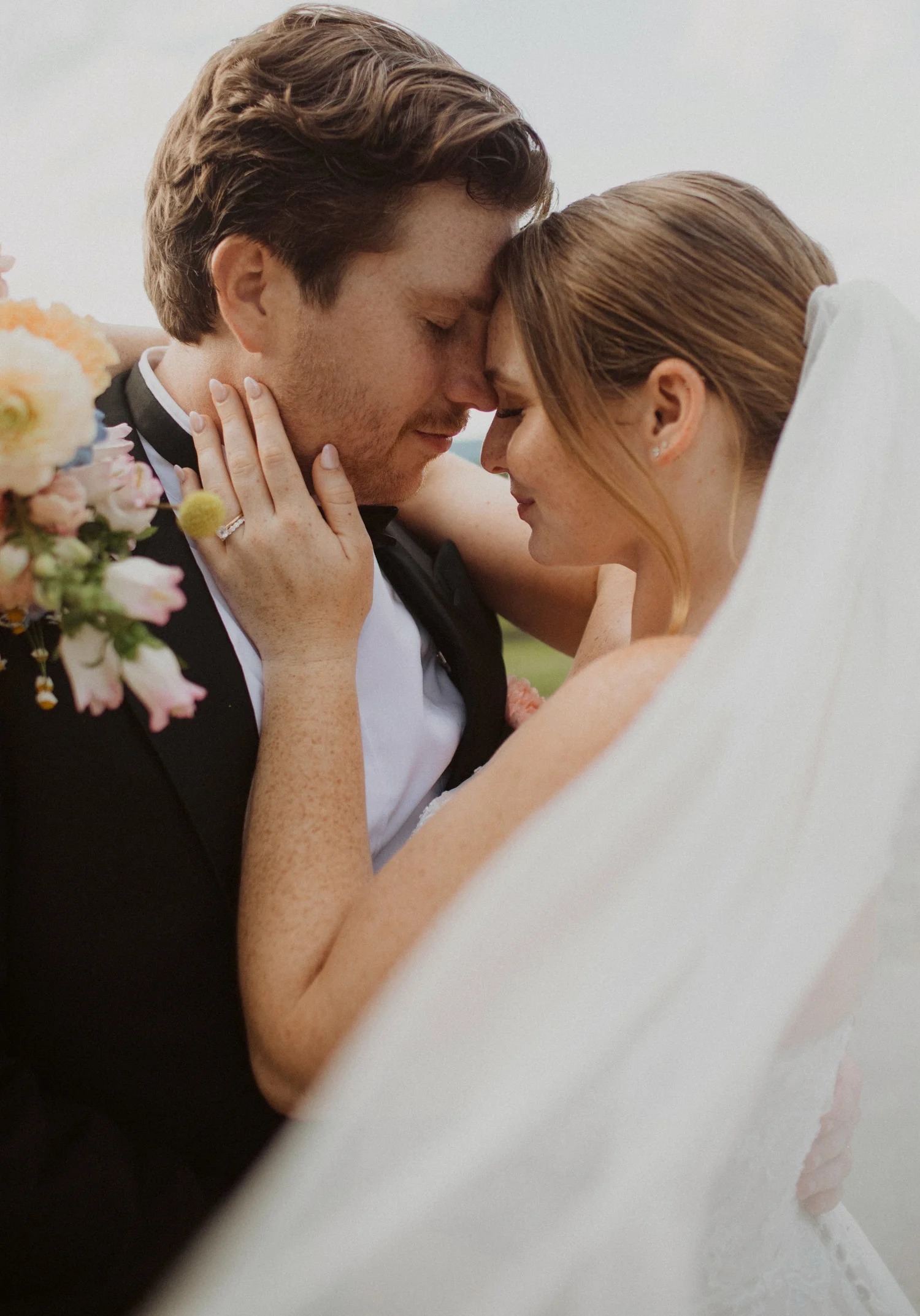 husband and wife posing during photography session at wedding venue in loudoun county