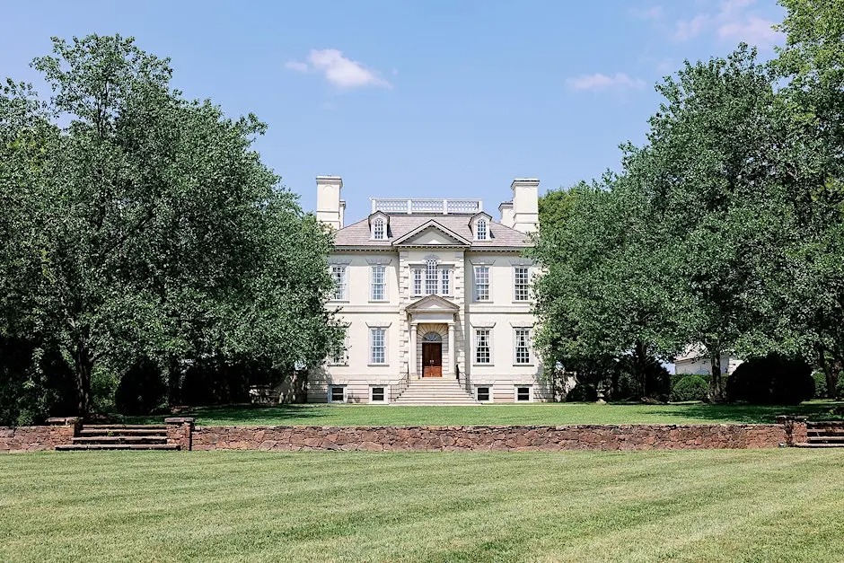 Great Marsh Estate Building surrounded by tall trees | wedding venue in northern virginia