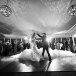 black and white photos of wedding couples first dance with smoke