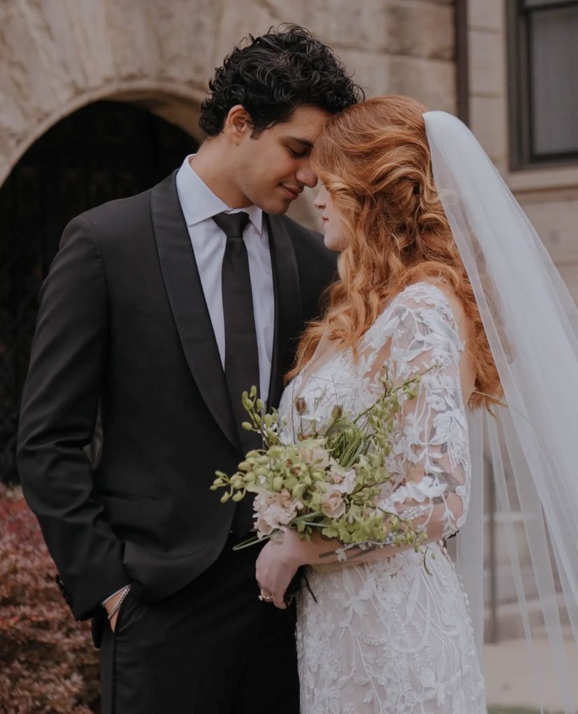 bride and groom touching foreheads after wedding ceremony
