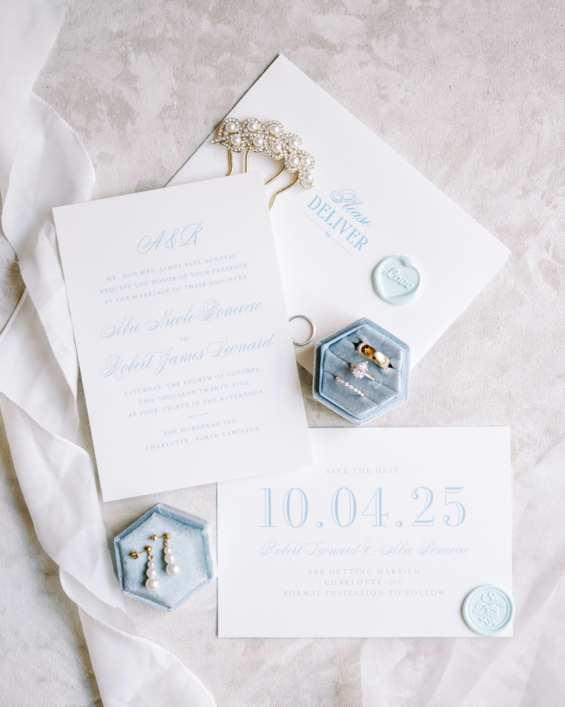 Wedding invitation suite with soft blue details and rings, Charlotte wedding stationery inspiration Wed Society Charlotte