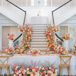 grand staircase with cascading florals