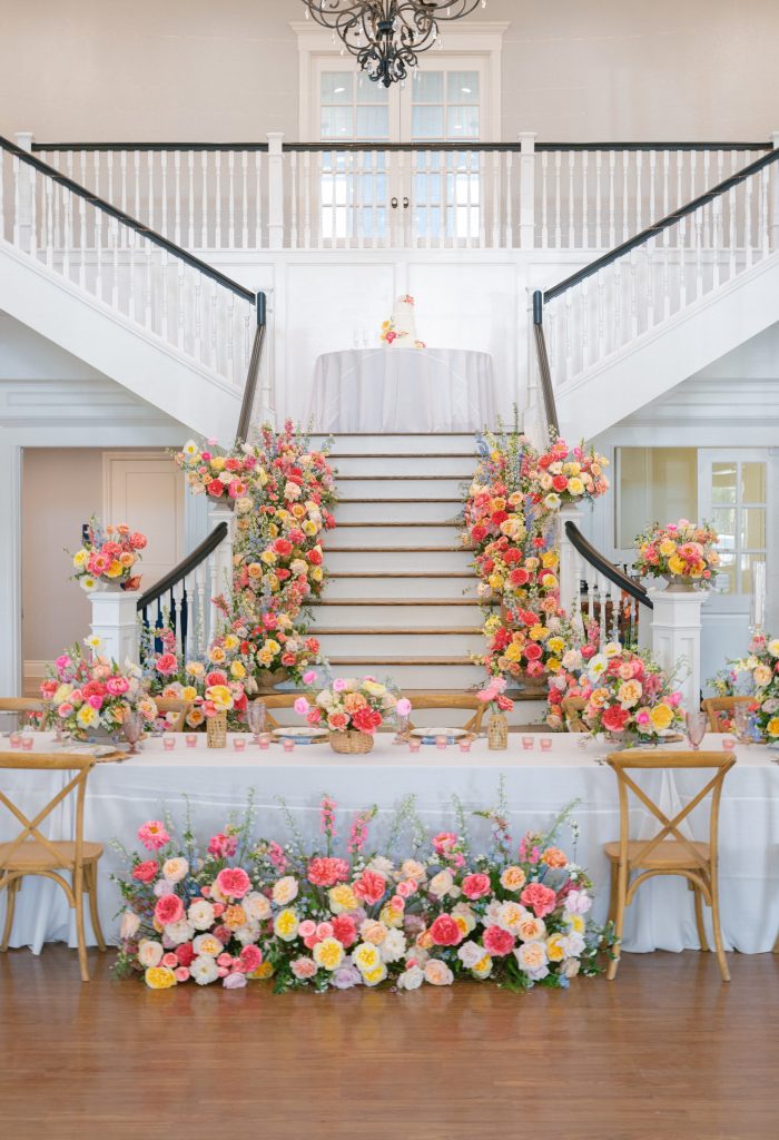 grand staircase with cascading florals