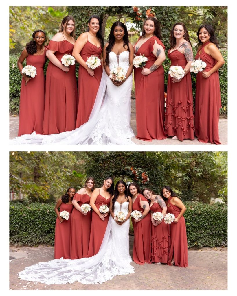bridesmaids in orangy red dresses with the bride in a beautiful white lace gown