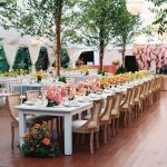 Outdoor wedding ceremony with upscale vintage tables and chairs