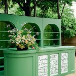 Pastel green bar area at outdoor wedding cocktail hour. personalized wedding decor