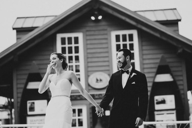 husband and wife smiling during wedding