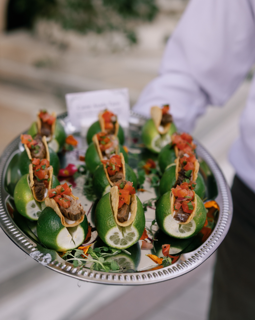 catering passing appetizers at cocktail hour taco in a lime