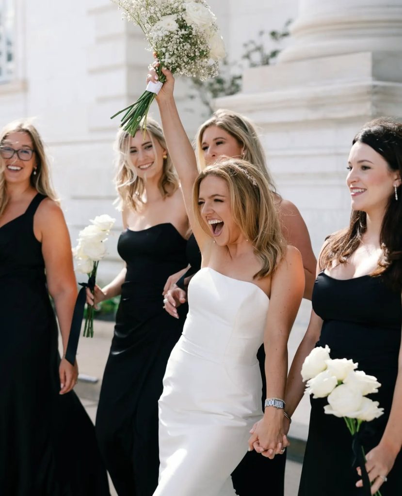 bride and bridesmaid cheering at washington dc wedding