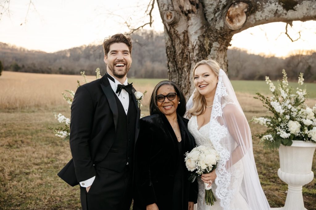 Wedding officiant Living Ceremonies with happy couple