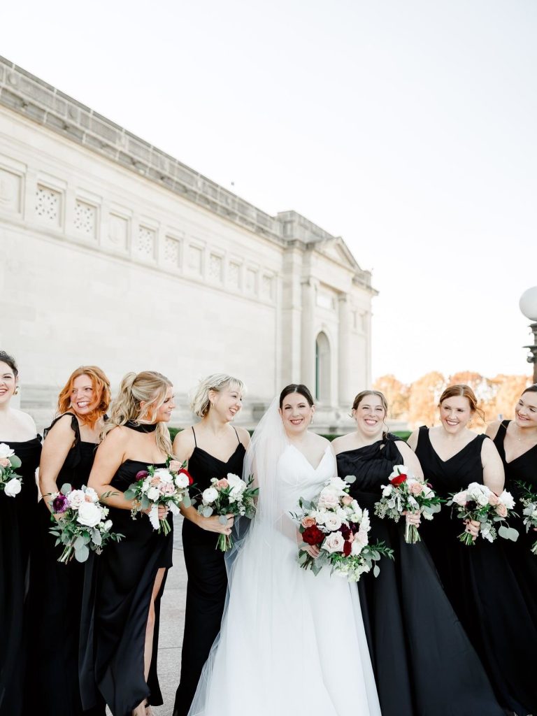 Bride with her bridesmaids dressed in black. Captured by Danielle Ambry Photography.