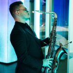 moody image man playing jazz music