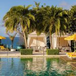 pool cabana in the Caribbean planned by a travel agent