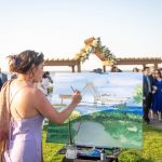 live painter at wedding ceremony outdoors creative experiential wedding gift